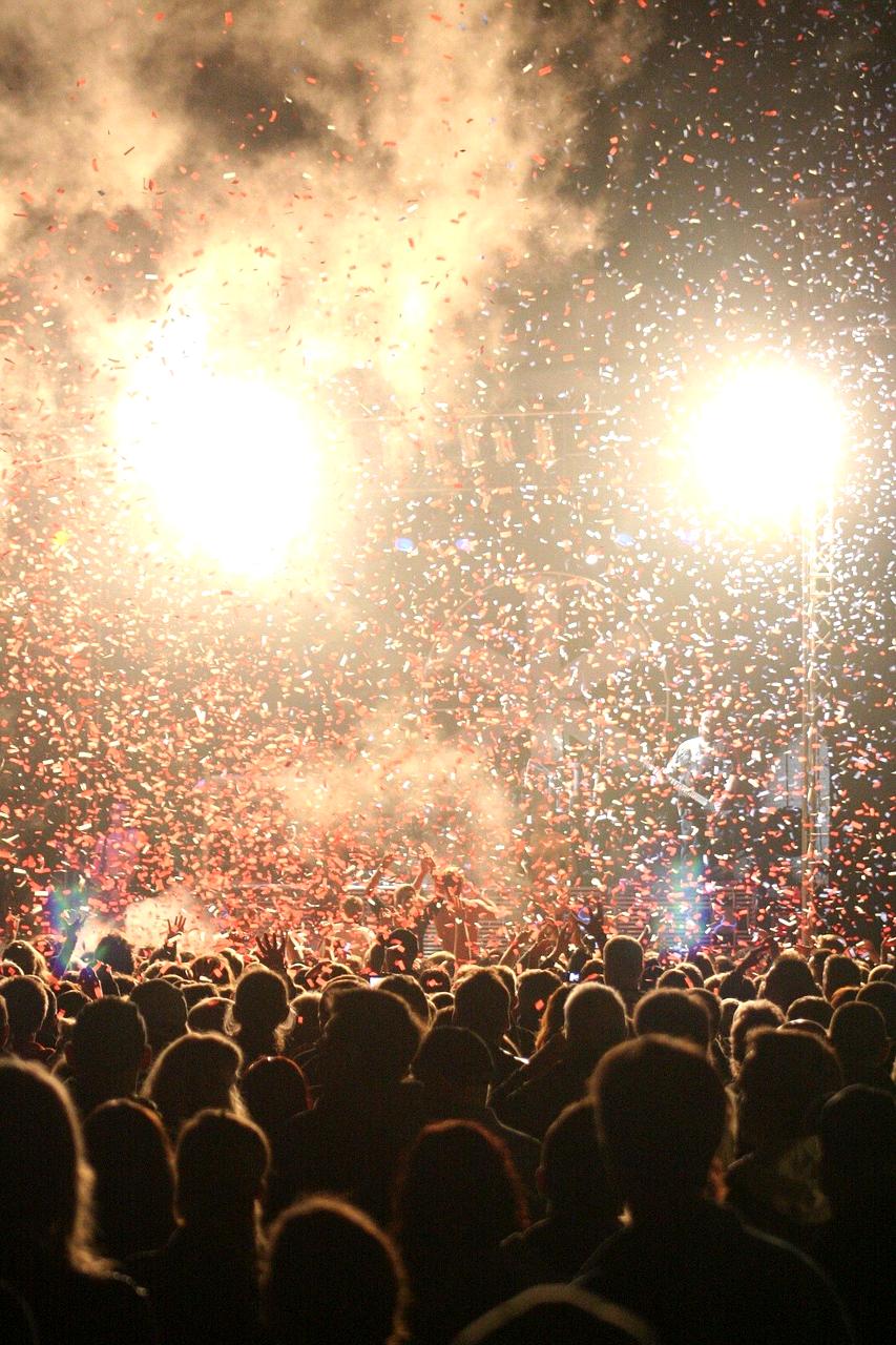 Professional entertainment stage with dramatic lighting and sound equipment